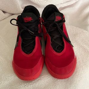 Nike hustle basketball shoes red and black .  boys 5.5 youth